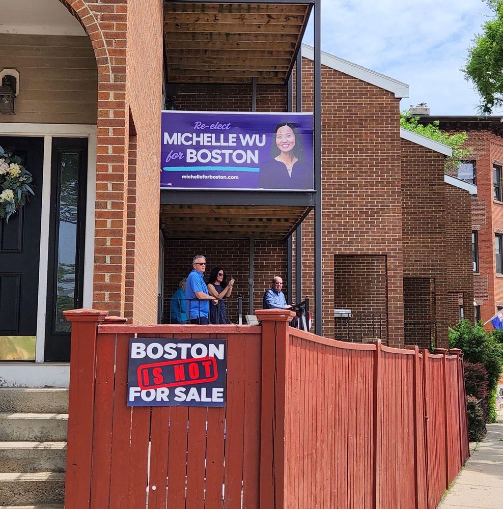 Boston is not for sale sign in Charlestown at the bunker hill day parade