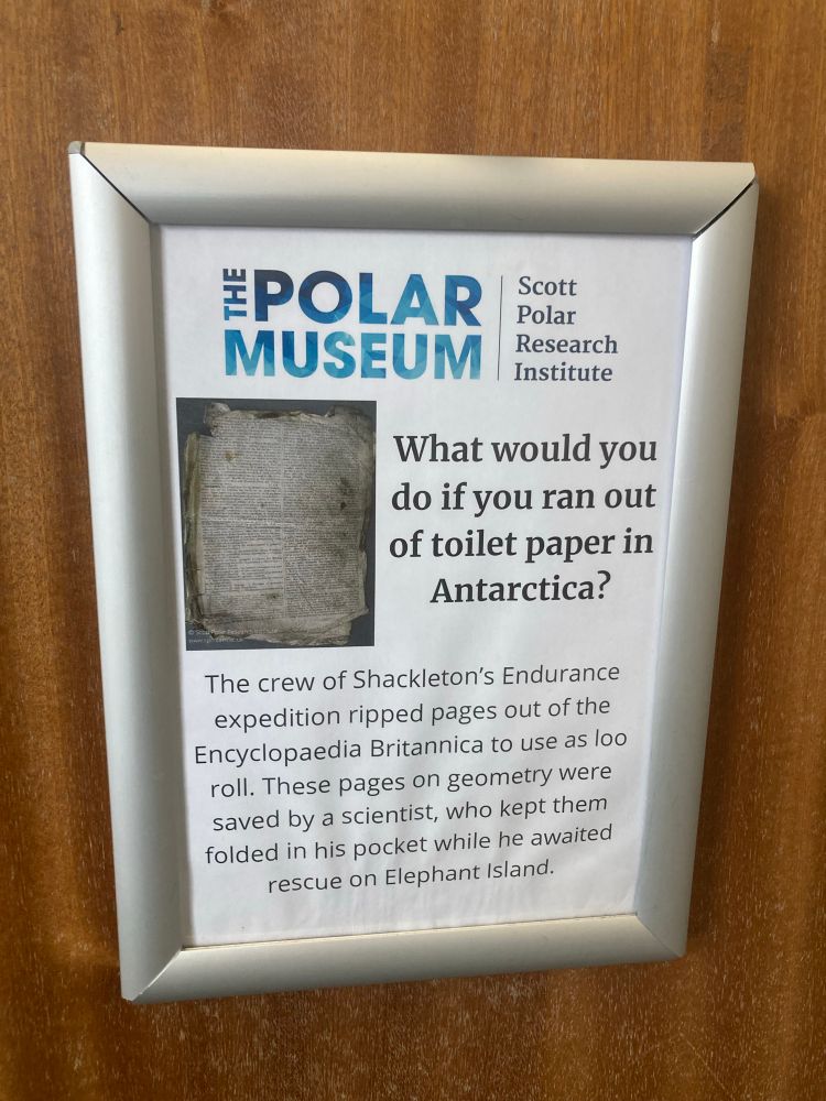 An informative notice inside a museum toilet.