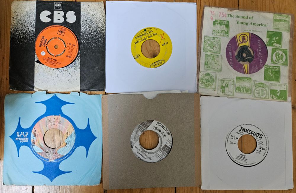 6 seven inch singles: American Spring "Shyin' Away"; The Yardbirds "Over Under Sideways Down"; The Temptations "Psychedelic Shack"; Ohio Players "Funky Worm"; The Paragons "Black Bird Singing"; Fleur de Lys "Circles"