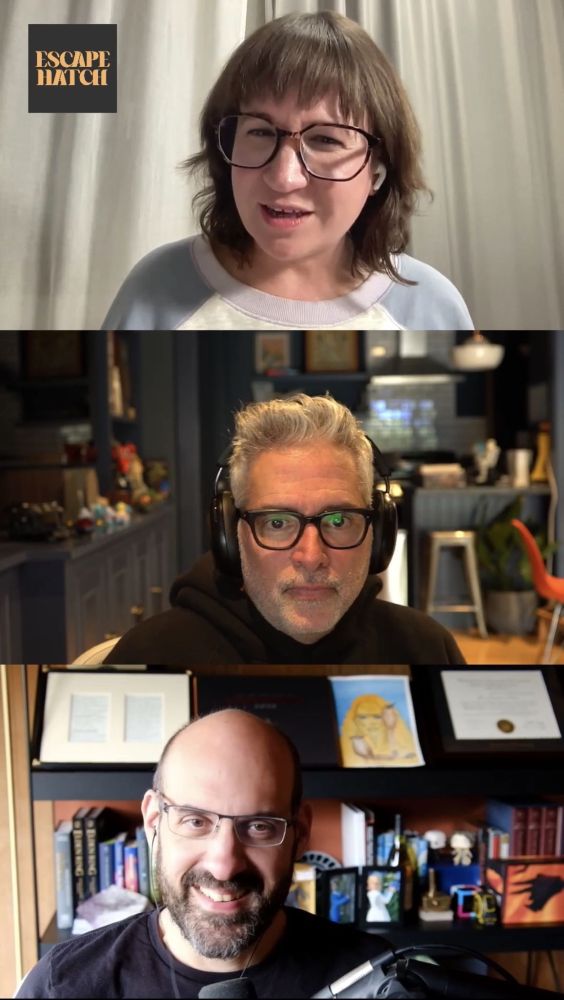 A screencap of a recent Escape Hatch episode video chat. I'm in the top window, white curtain behind me, looking DEEPLY skeptical for reasons that will be revealed if you listen to the ep. Matt Herrero is in the middle, a nice kitchen behind him, looking patient. Jason Goldman's in the bottom window, bookshelves behind him, with a shit-eating grin on his face. We're all wearing glasses.