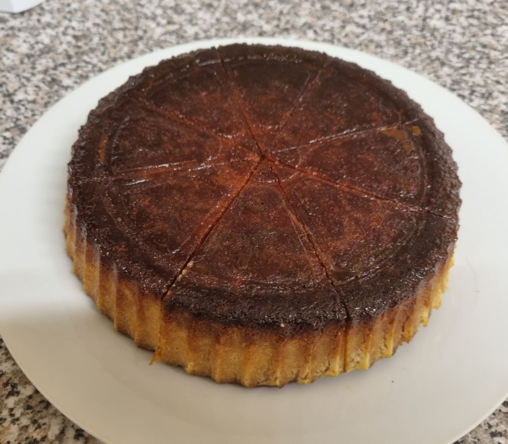 A cake with a top of caramel 