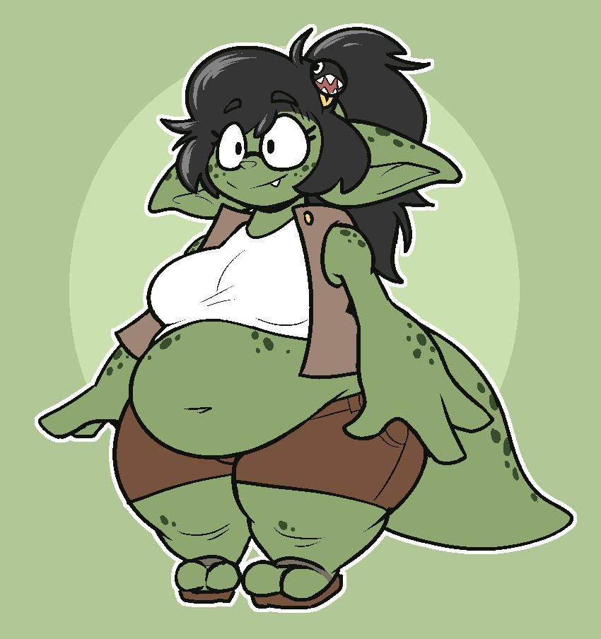A short, chubby goblin woman wearing a t-shirt, jacket, shorts, and sandals, with a big pair of glasses and a small round hairpin. She has green skin, freckles, black hair, and a big tail and ears. Her belly is uncovered and exposed.