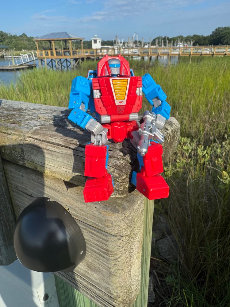 Gears sitting on a wooden post