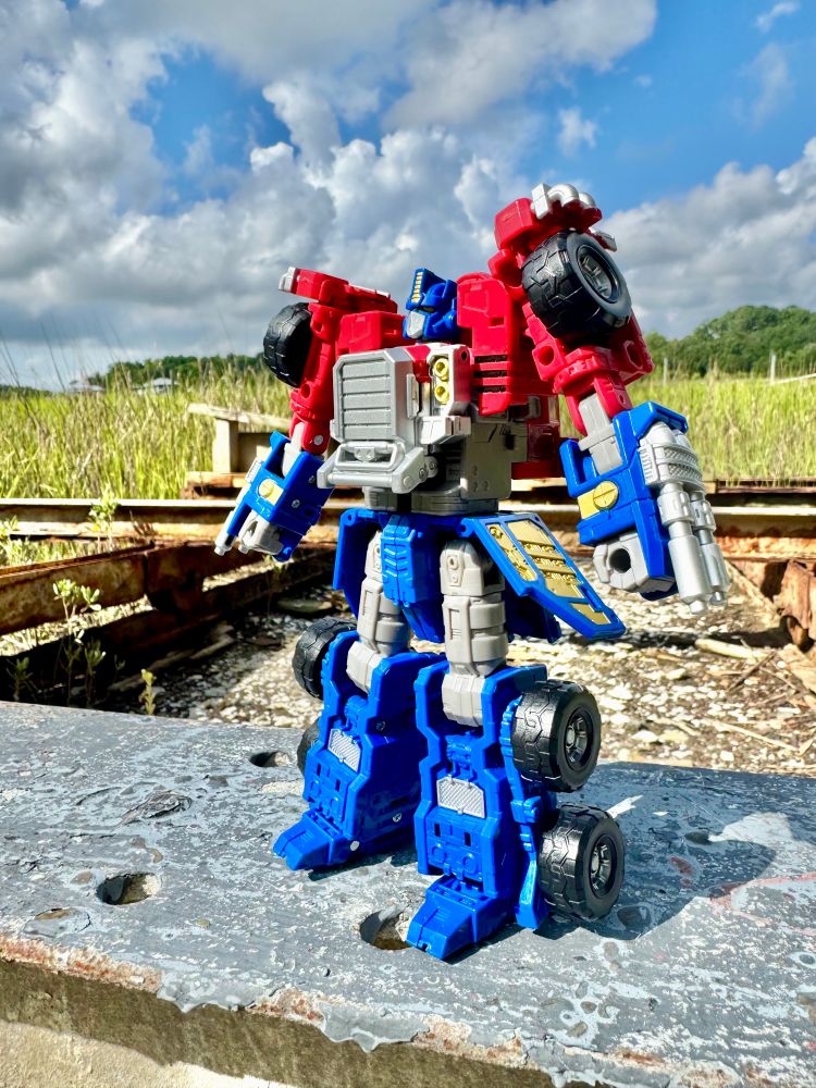 Legacy Evolution Armada Optimus Prime facing the sun.