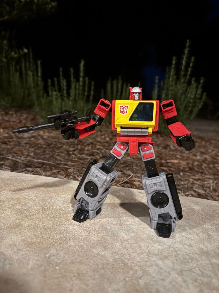 Blaster in robot mode armed with….a blaster.