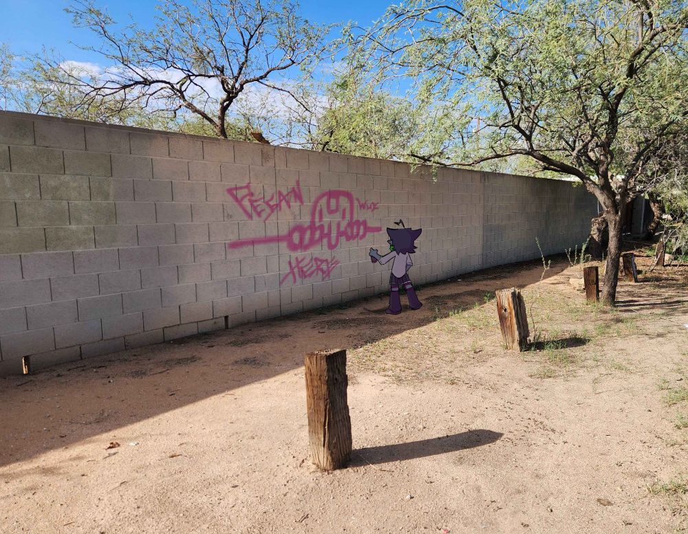 A tiny Pecan spraypainting "Pecan wuz here" on the side of a brick wall along with a little Killroy-esque doodle
