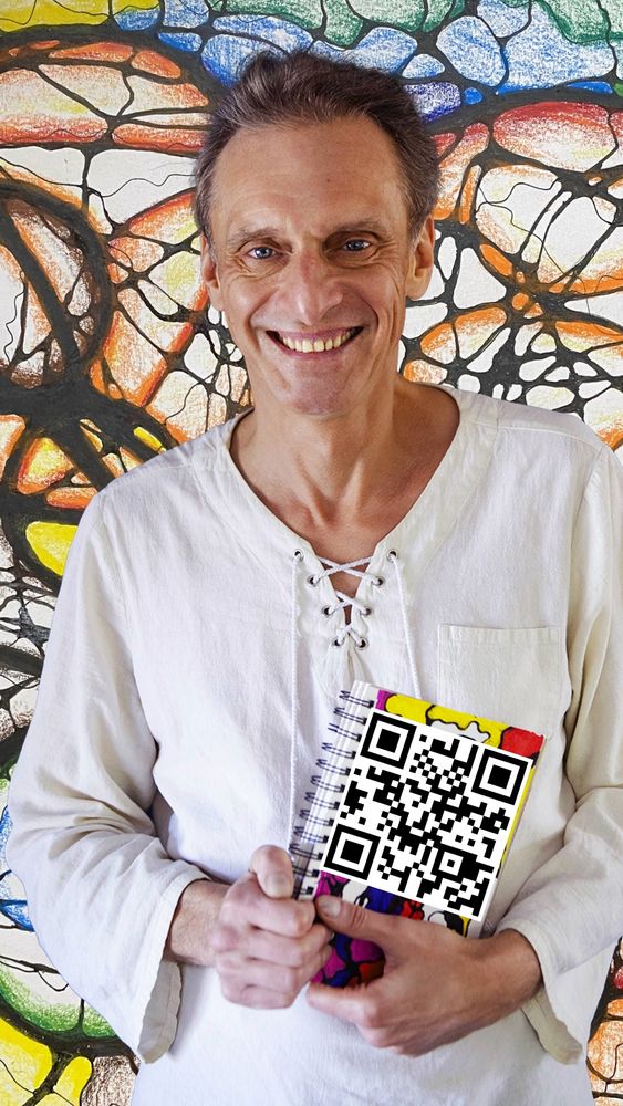 Picture of Anton and his business card pointing to http:\\neurographic.art