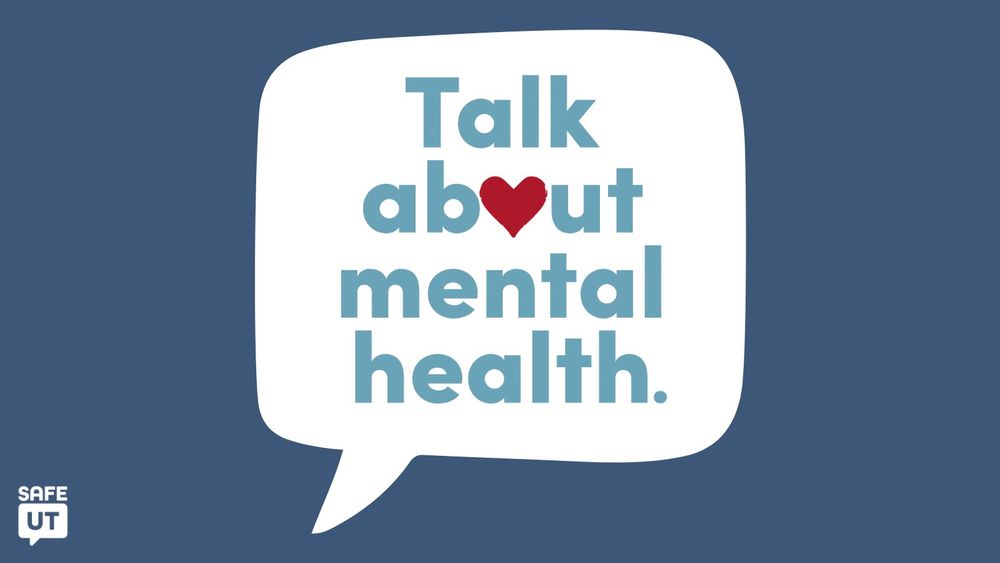 Graphic with a blue background and an illustrative white chat bubble. "Talk about mental health." is inside the chat bubble. The "o" in "about" is a red heart.