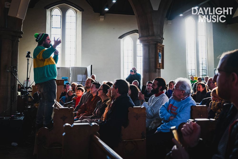 Pictish Trail preaching/singing from the front of St John's Church in Leytonstone. Photo by Paul Hudson.