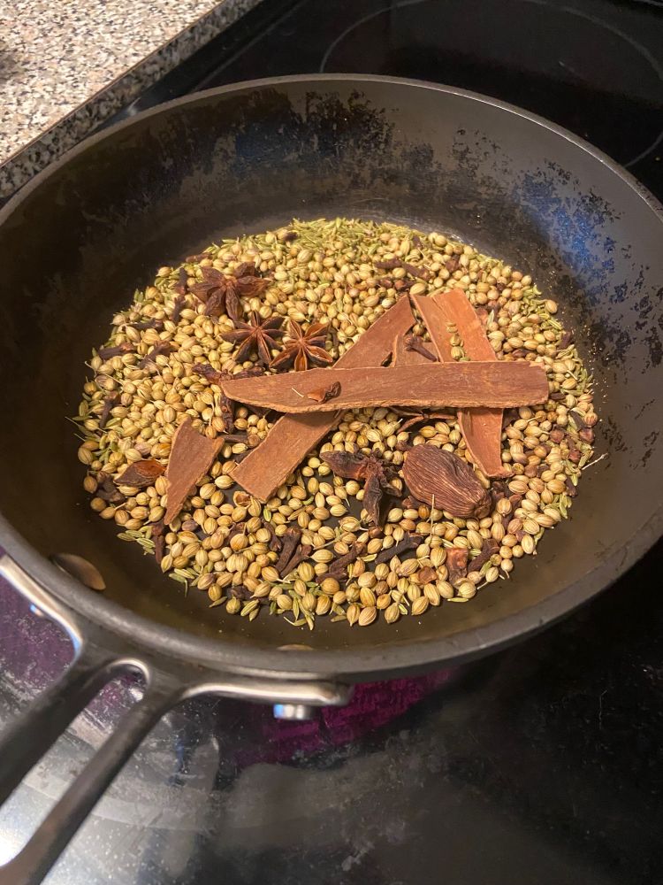 Photo of spices in a frying pan. 
