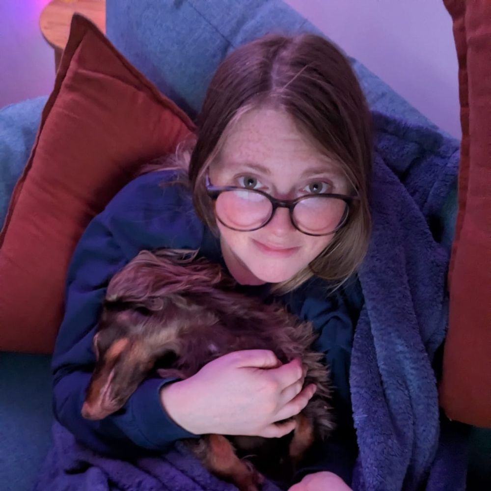 My dog Pippin VERY asleep on my lap