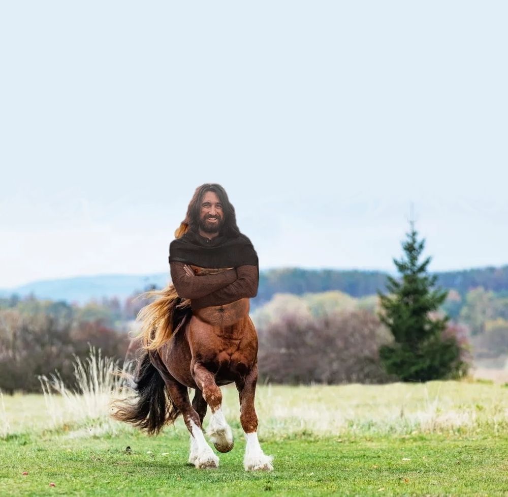 Photomanipulation: Bay colored Percheron running toward us. Head of Ferdinand Kingsley as 1389!Hob Gadling. Covered only on shoulders and arms. Hairy dad bod.