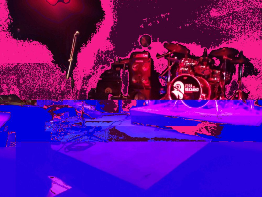 Distorted photo of a music stage.