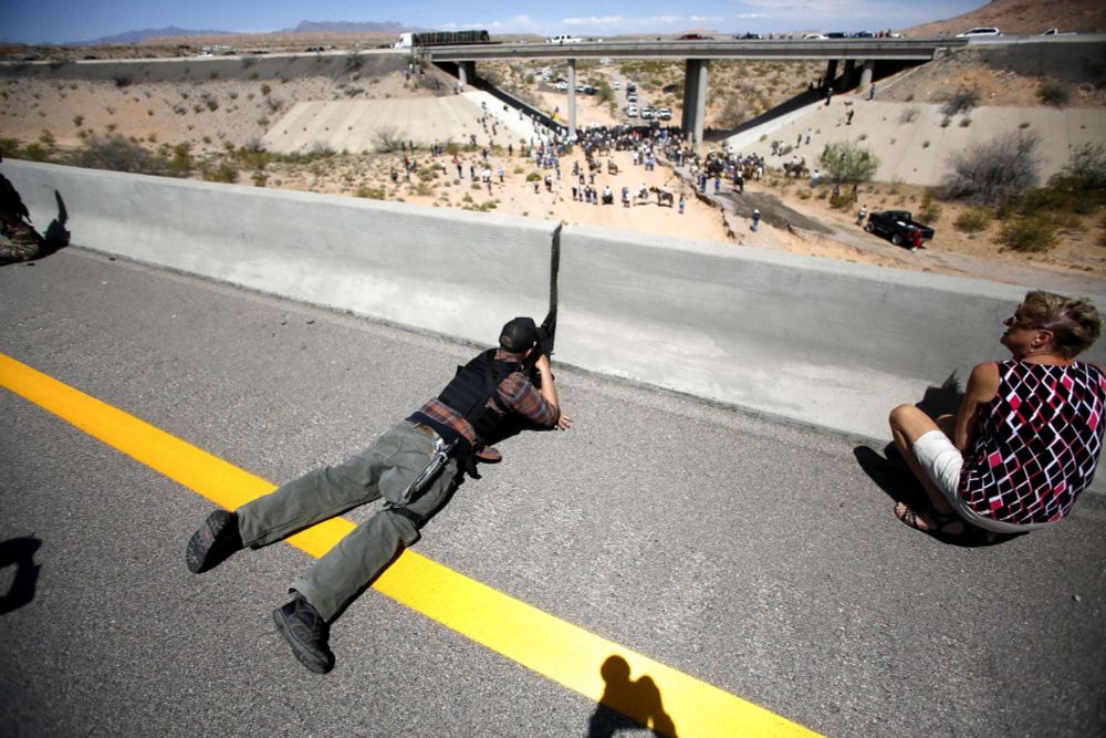 Militant right wing armed protestors confront federal regulators at Bundy Standoff 2014