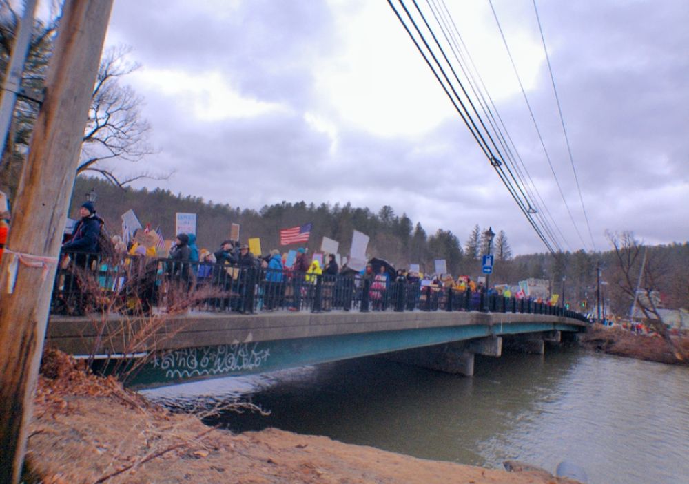 Vermonters March over bridge during Hands Off Protest