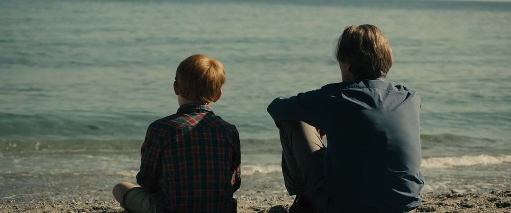 scene featuring a young tim and his dad in richard  curtiss's film about time