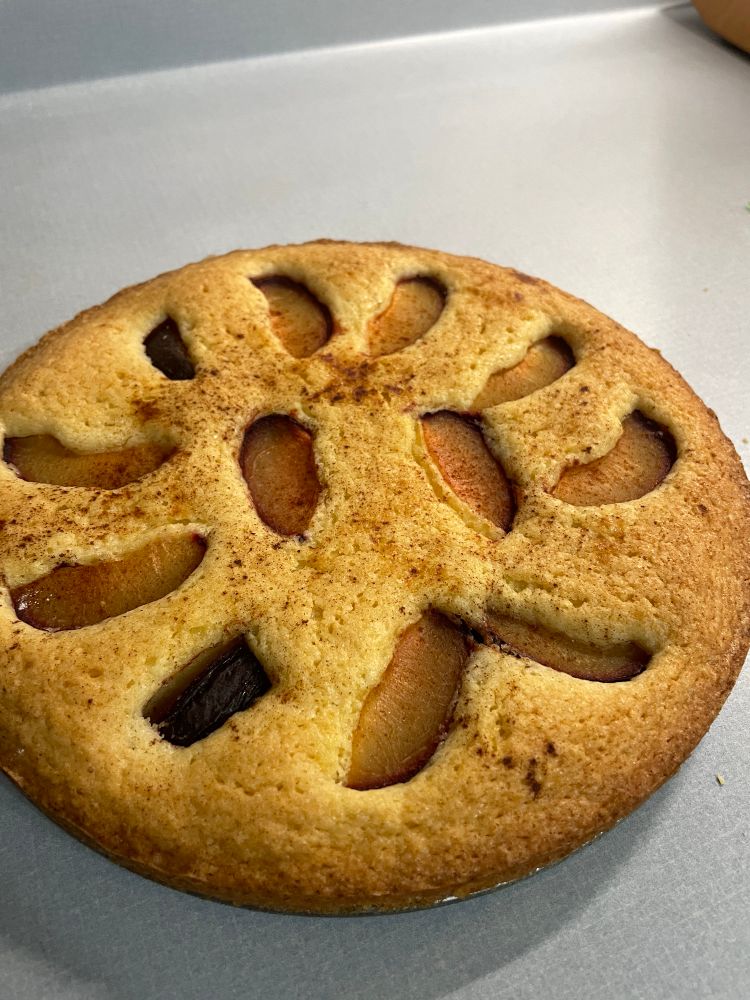 The classic New York Times plum tort sitting on a countertop. 