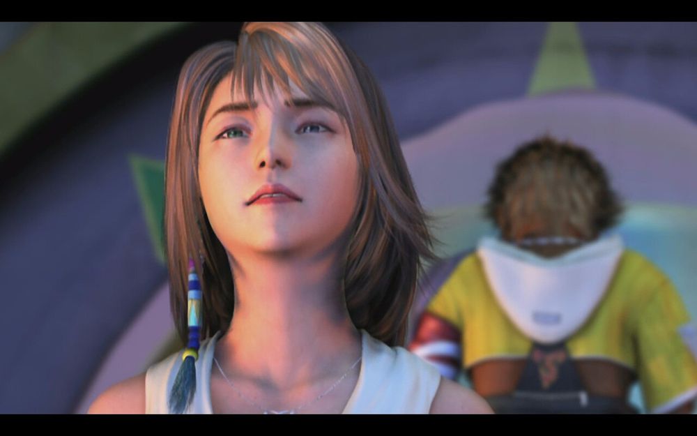 Yuna sadly looks towards the sky while behind her, facing away, Tidus’s looks down.