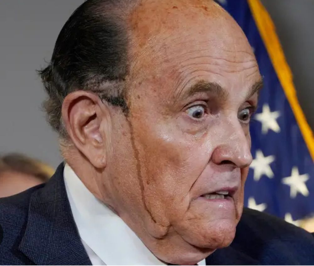 Giuliani with hair color dripping off his face. 