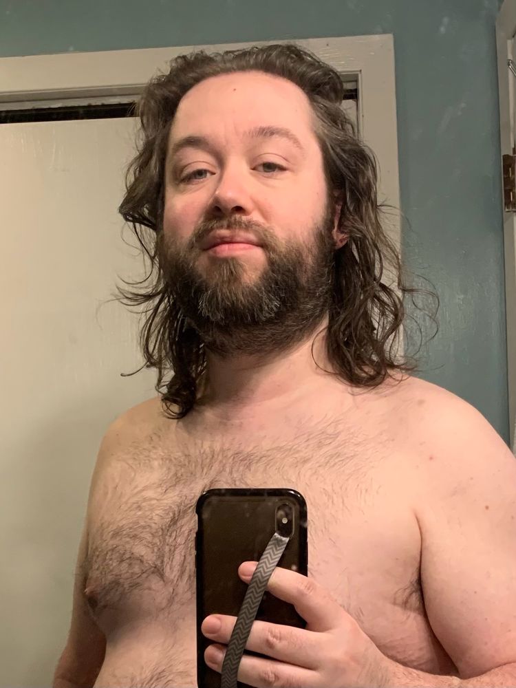 Shirtless mirror selfie of Alec before his morning shower