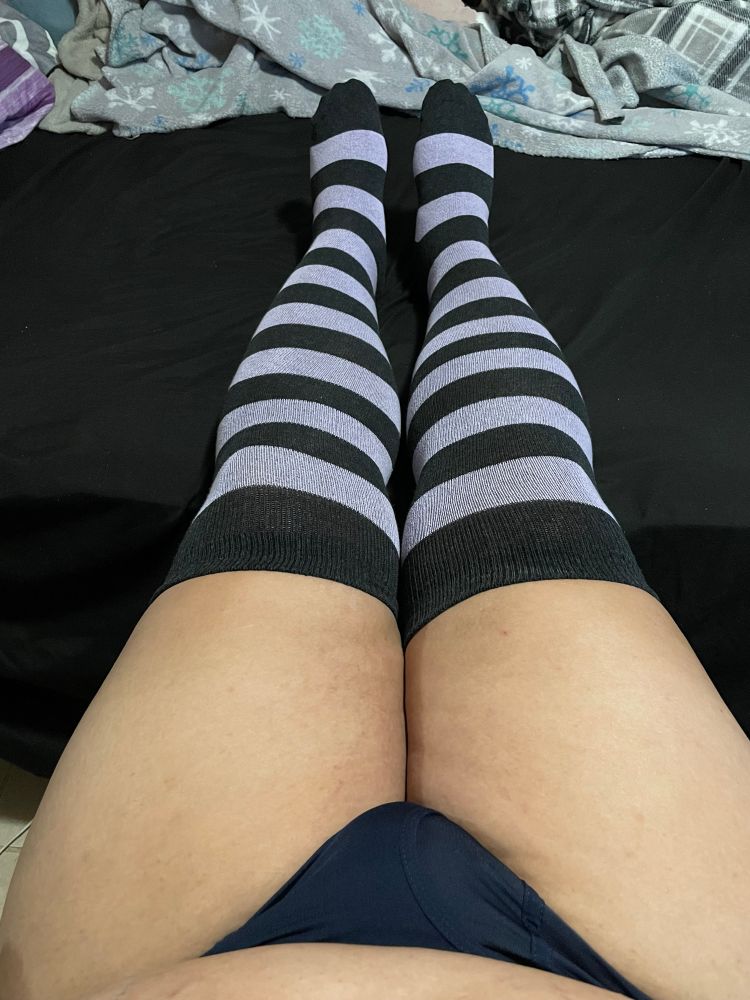 Selfie showing off lavender and dark blue striped thigh high socks I bought, there’s also some thiccc thighs and a nice bulge~