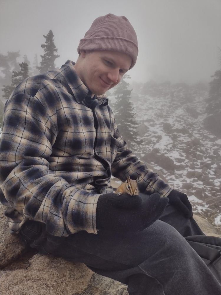me, holding a chipmunk in my palm 
