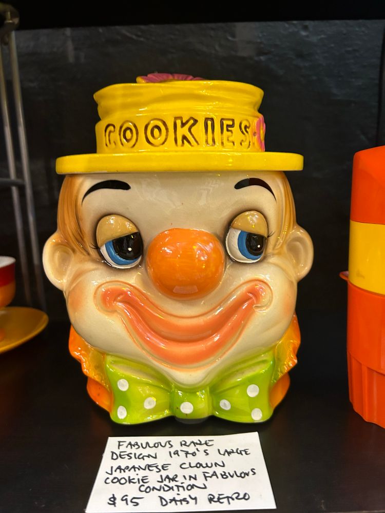 A silly looking 1970s clown cookie jar. Ceramic. For sale. $95