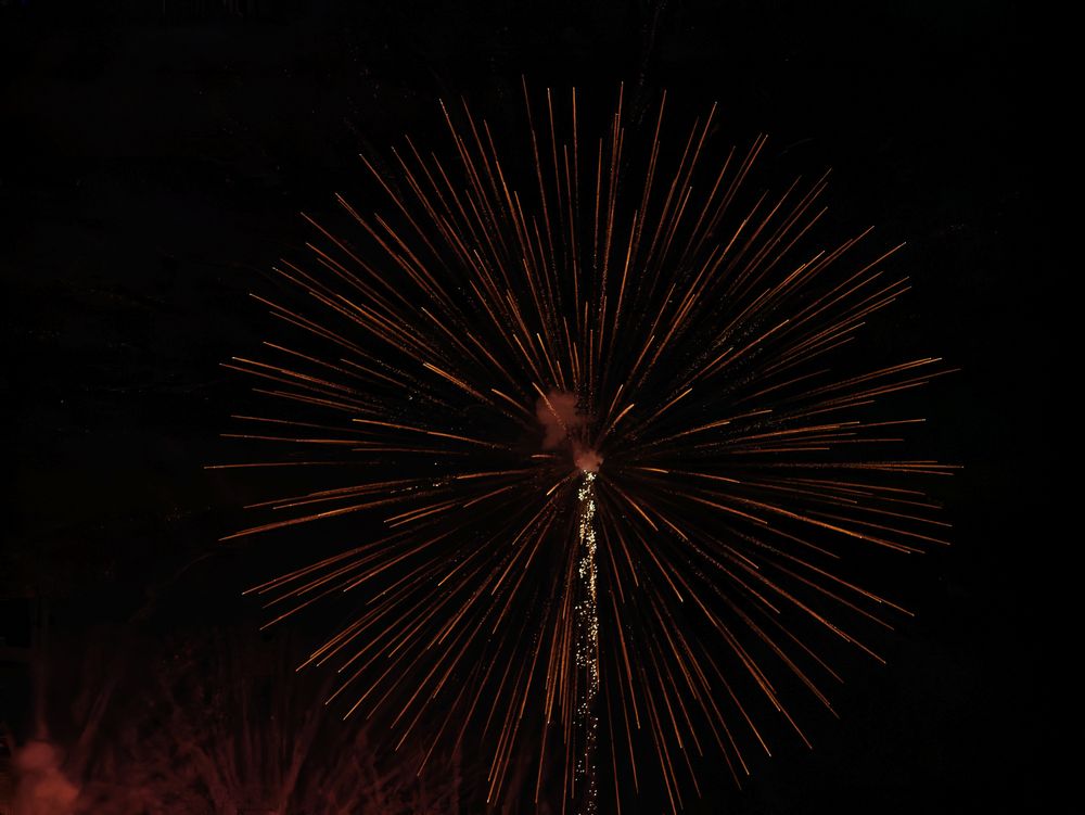 red-orange fireworks exploding