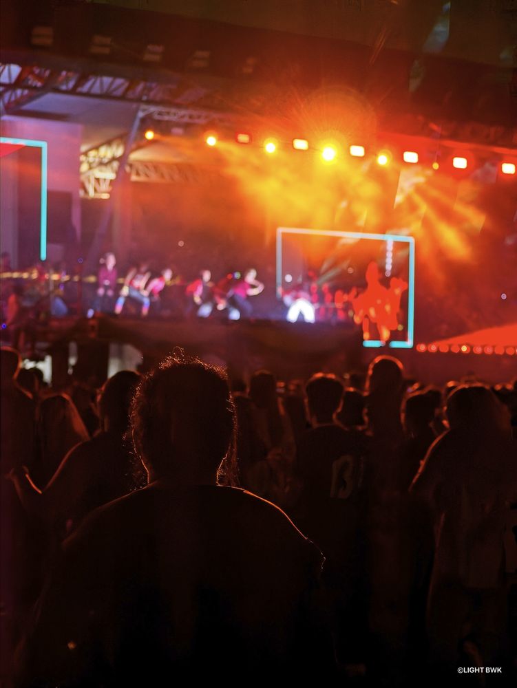 silhouette shot of the participents toward the stage