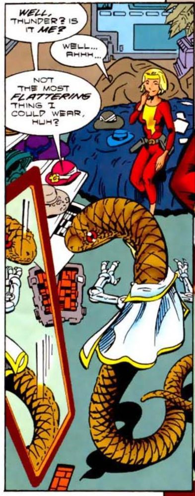 Jeka, the giant snake with robot arms, puts on a cape while a blond girl watches on from a bed.
Jeka: "Well, Thunder? Is it me?"
Thunder: "Well... ahhhh..."
Jeka: "Not the most flattering thing I could wear, huh?"