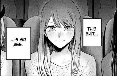 A black-and-white illustration of a girl with long hair, sitting in what appears to be a theater or auditorium, with tears in her eyes and a distressed expression on her face. There are two speech bubbles, one saying "THIS SHIT..." and the other "...IS SO ASS."