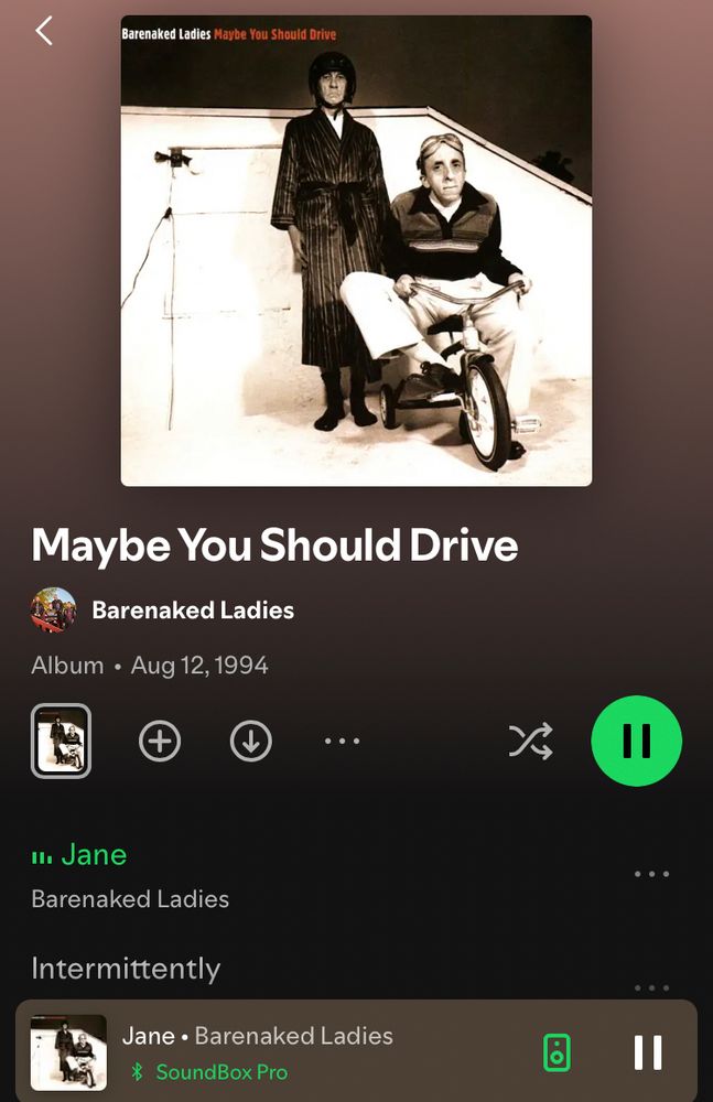 Spotify interface. Album: Maybe You Should Drive. Artist: Barenaked Ladies. Release date: August 12, 1994. Song playing: “Jane”