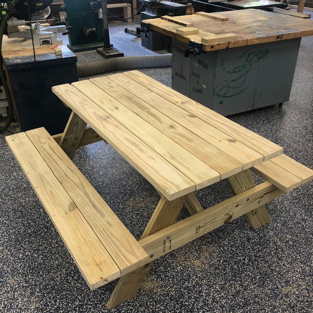 Our picnic table, just completed, in a school woodshop.