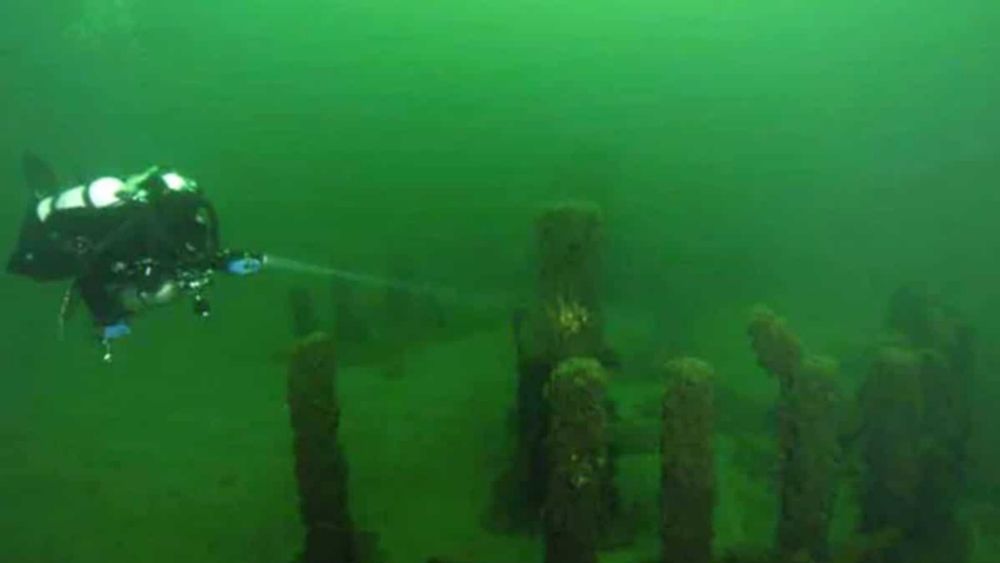 There is an ancient underwater 'Stonehenge' beneath Lake Michigan in US. It was created by...