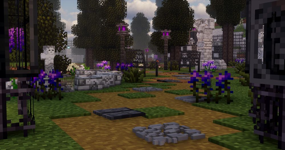 the entrance to a peaceful graveyard, with purple flowers and a welcoming path. statues decorate the place, along with iron benches.