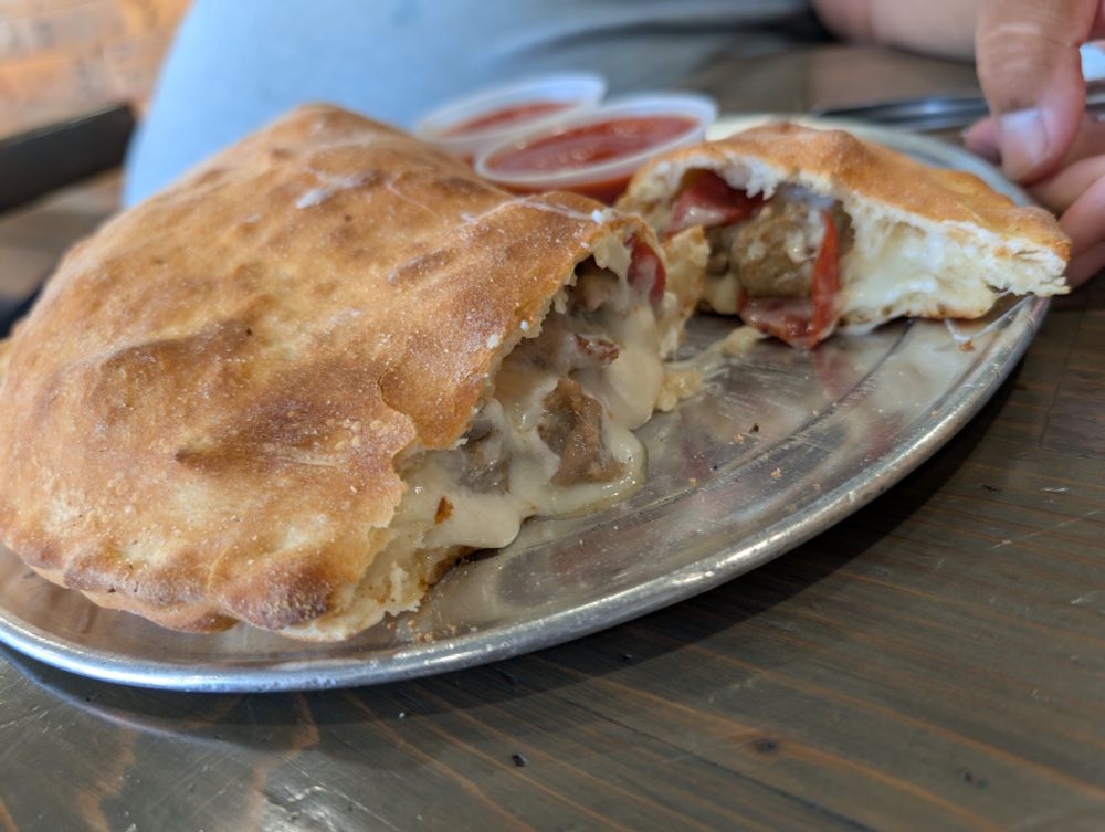 Picture of a massive calzone meant to feed two to three people