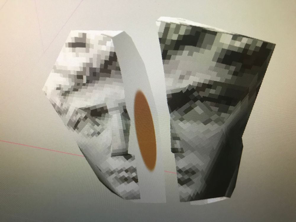 The head of Michelangelo’s David split in half, with a yolk inside.