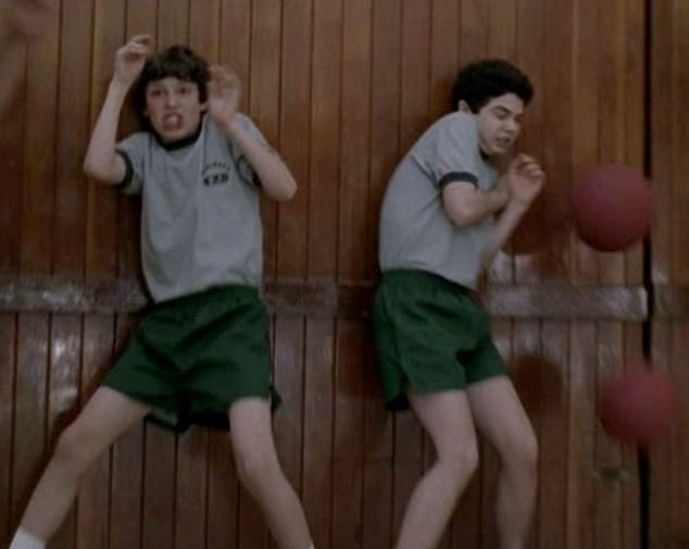 Sam Wier and Neil Schwieber getting pelted by rubber balls in gym class