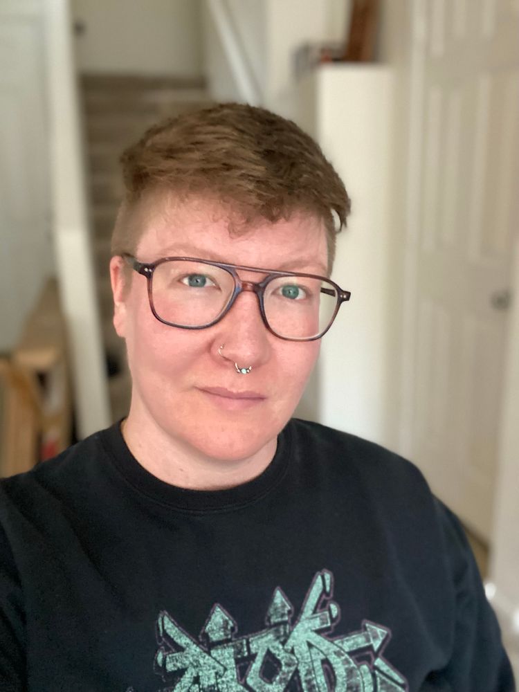 Sage in dark brown tortoise shell square aviator style frames 