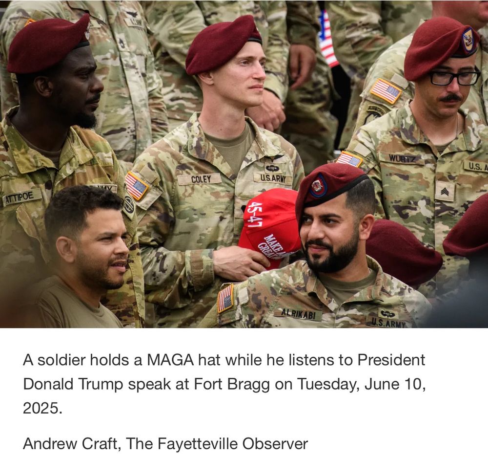 A soldier holds a MAGA hat while he listens to President Donald Trump speak at Fort Bragg on Tuesday, June 10, 2025 ANDREW CRAFT, THE FAYETTEVILLE OBSERVER 