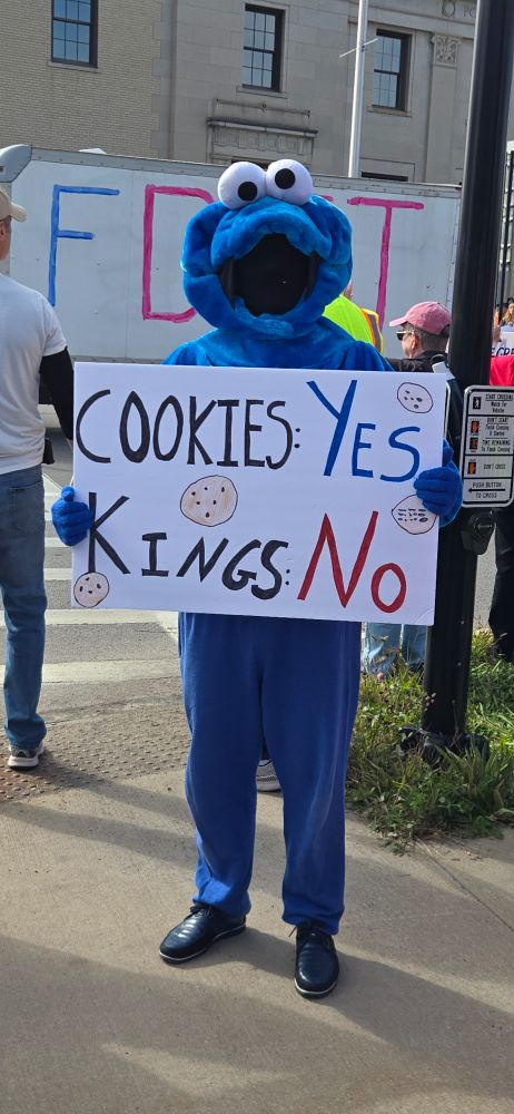 Cookie Monster with sign
