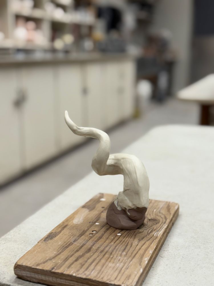 New stoneware horn being sculpted.