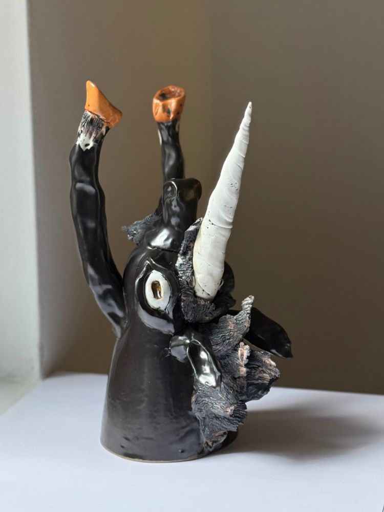 Porcelain cup in the shape of a unicorn.