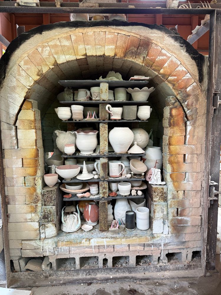 Kiln loaded full with ceramics pieces before the firing. 