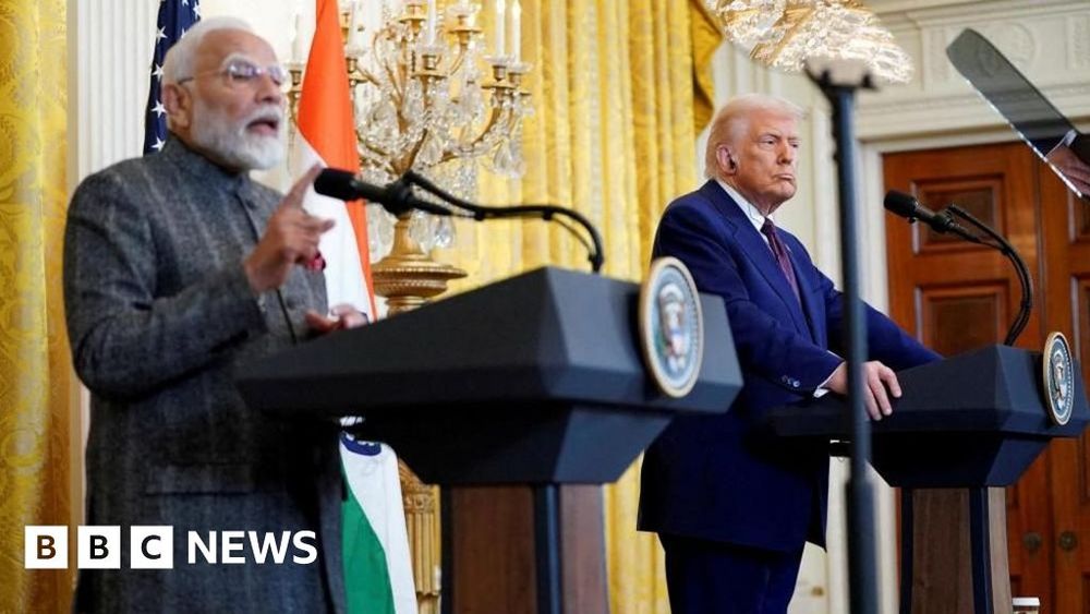 The US president says India doesn't care "how many people in Ukraine are being killed" - but India calls the tariff threat "unjustified".