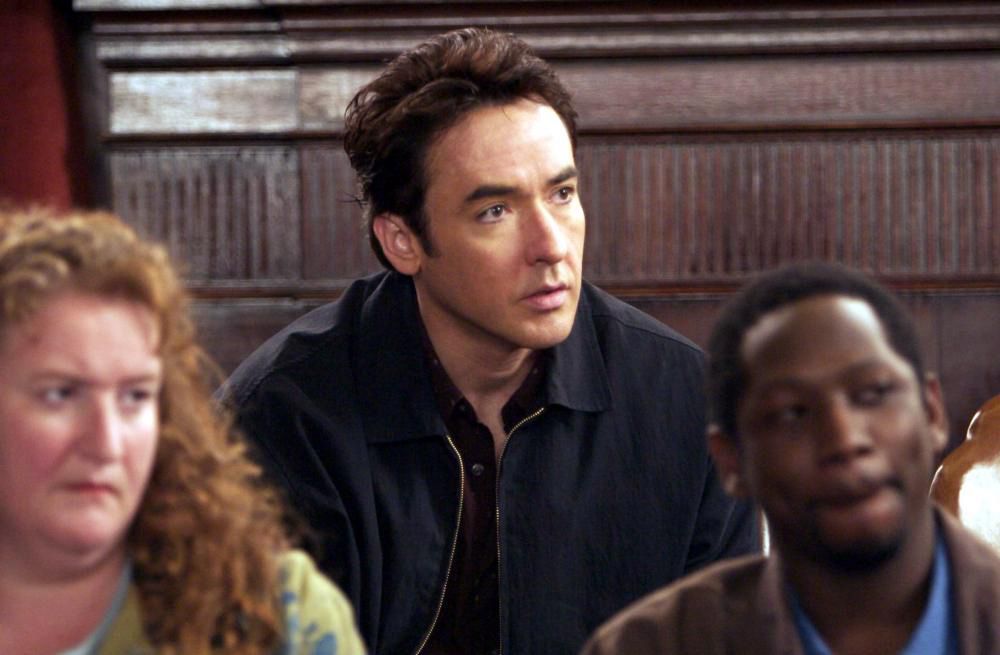 Movie still of John Cusack playing Nick Easter in movie “Runaway Jury”