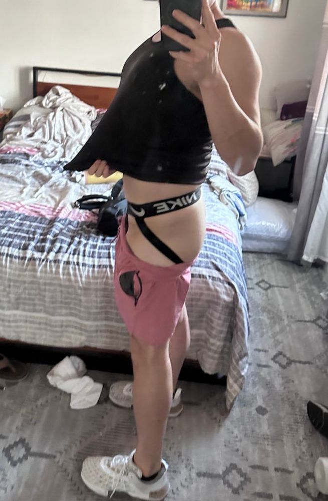 Altpap1to poses after leg day in his jock, with his pink shorts slightly below the jockstrap