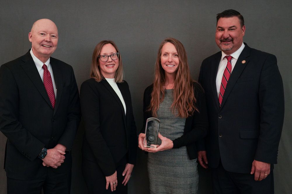  From left: Delaware Chief Justice Collins J. Seitz, Jr., NCSC President Elizabeth Clement, Stacey Marz; Nebraska State Court Administrator Corey Steel.
 