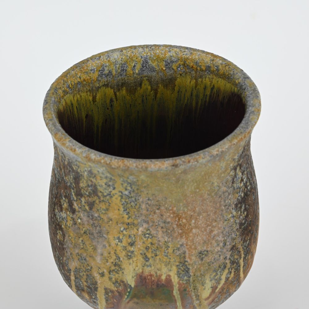 Close-up of the tulip cup, showing colorful runs in the glaze liner.