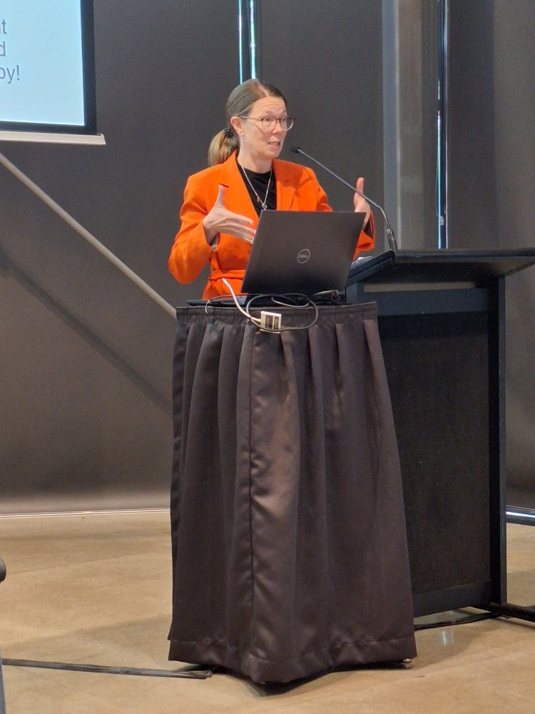 Becke with hands motioning forwards